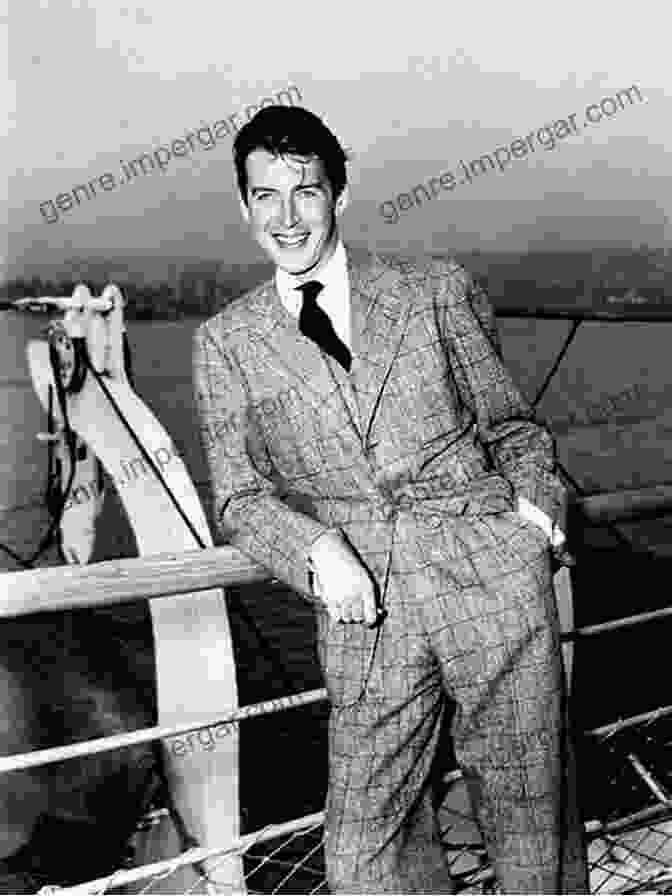 A Black And White Photo Of Jimmy Stewart In A Suit And Tie, Smiling. Jimmy Stewart: A Biography Marc Eliot