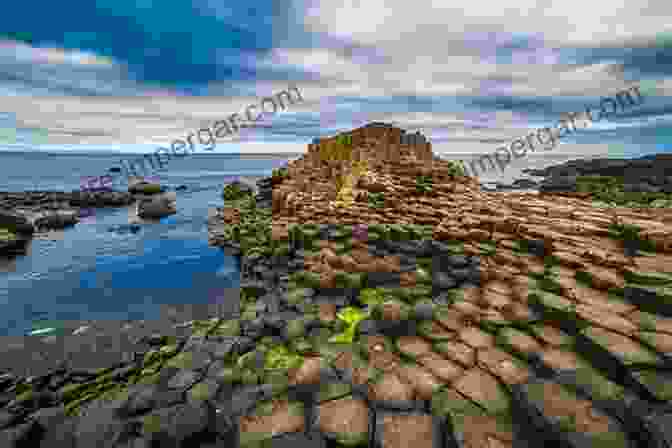 A Breathtaking View Of The Giant's Causeway, With Its Hexagonal Basalt Columns Rising Out Of The Sea. Maritime Archaeology On Dry Land: Special Sites Along The Coasts Of Britain And Ireland From The First Farmers To The Atlantic Bronze Age