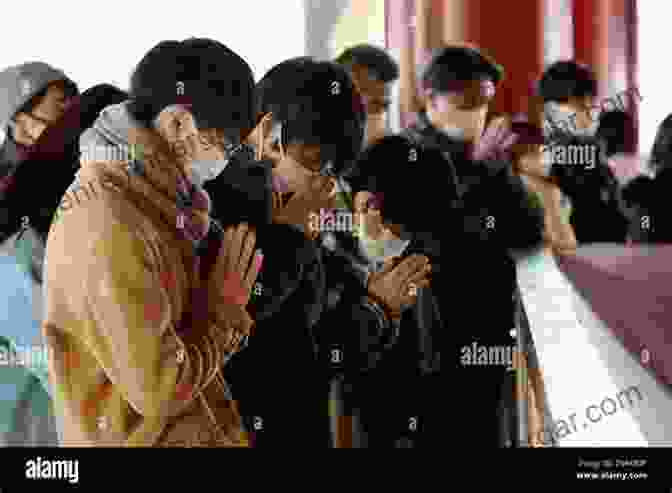 A Group Of People Wearing Masks Pray At A Temple During A Festival. Zen In The Time Of Corona: A Photographic Homage To Japanese Buddhism During The Coronavirus Pandemic