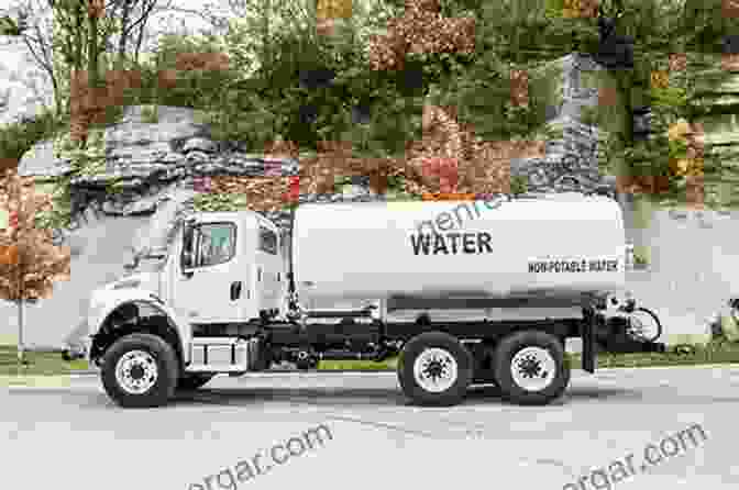 A Large Tanker Truck Delivering Water To A Commercial Building Large Volume Water Delivery Martin Sims